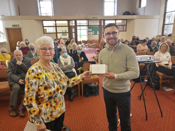 South Wales Argus: Jackie Kerr handing James Ward the £2,600 raised by Out & About Newport. Picture: Out & About Newport. South Wales Argus: Jackie Kerr handing James Ward the £2,600 raised by Out & About Newport. Picture: Out & About Newport.
