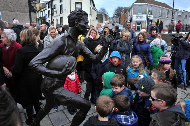 South Wales Argus: The unveiling of the Ken Jones statue off Broad Street, Blaenavon, in 2013.