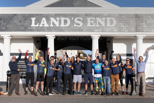 The Magnificent Seven team and supporters at Land's End