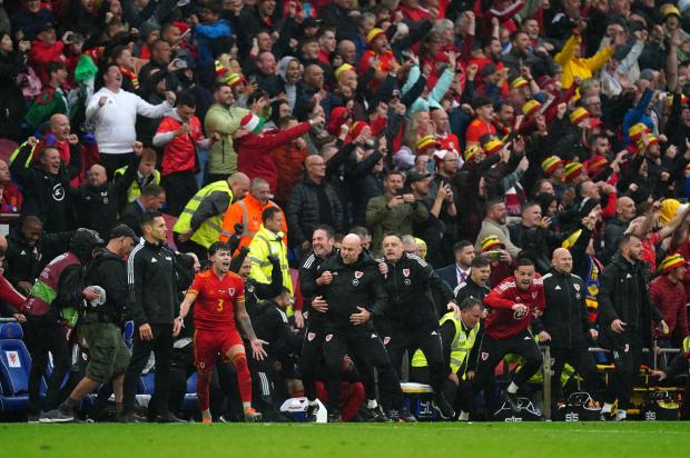 South Wales Argus: Joyous scenes at the final whistle in Cardiff. Picture: PA Wire
