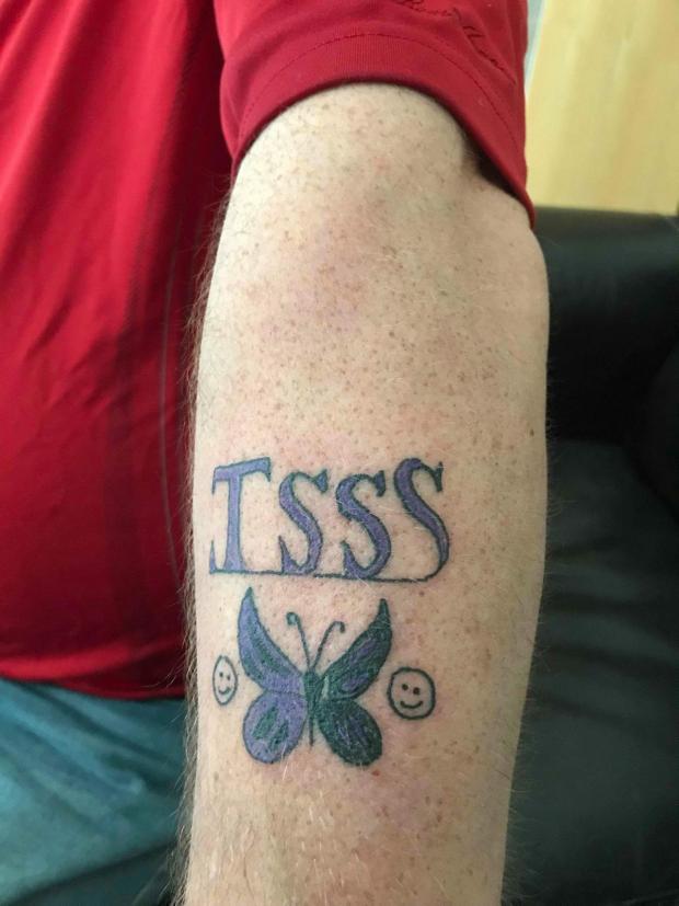South Wales Argus: Darren Rice shows off his TSSS tattoo