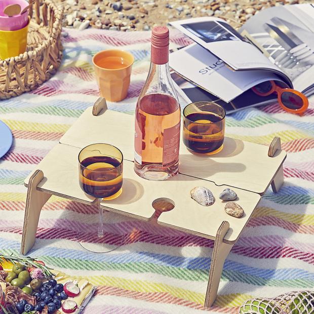 South Wales Argus: Personalised Portable Picnic Table Wine Holder. Credit: Not On The High Street