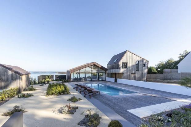 South Wales Argus: Modern villa with stunning sea views, swimming pool, Jaccuzi - Brittany, France. Credit: Vrbo