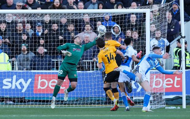 South Wales Argus: Nick Townsend prevents Bristol Rovers from grabbing a late equaliser. Picture: Huw Evans Picture Agency.