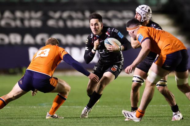 TESTER: Sam Davies on the run for the Dragons against Edinburgh, their first opponents in the coming campaign