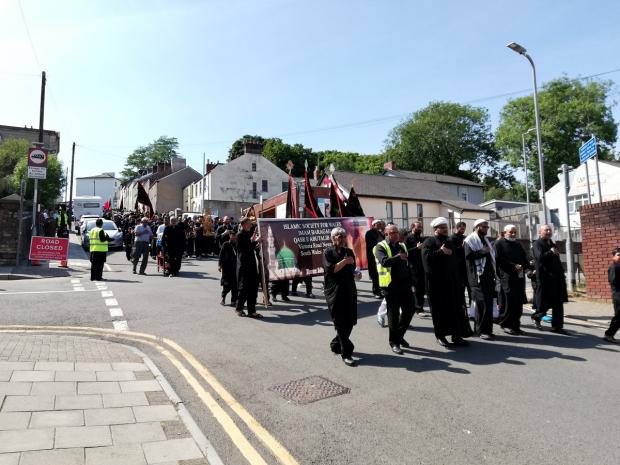 South Wales Argus: The procession enters the town.