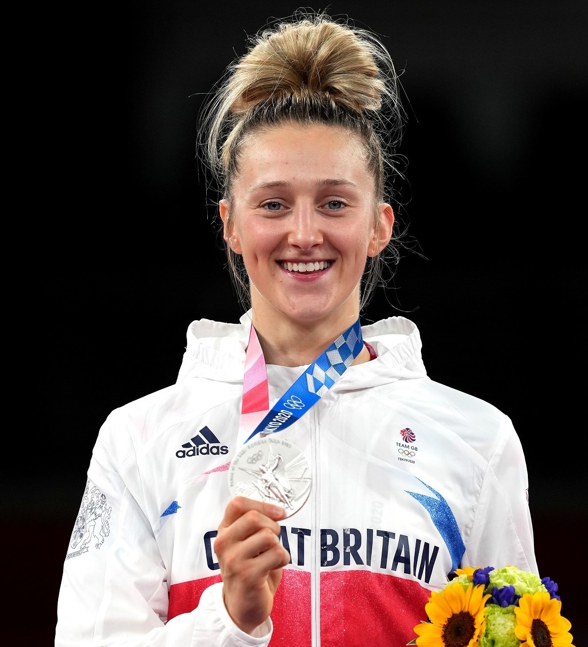 Great Britains Lauren Williams celebrates with the silver medal after the Womens 67kg Gold Medal contest at the Makuhari Messe Hall A on the third day of the Tokyo 2020 Olympic Games in Japan. Picture date: Monday July 26, 2021..