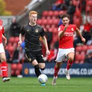 ATTACK: Newport County defender Ryan Haynes takes the fight to Swindon Town on Saturday