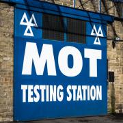 An MOT tester has avoided jail after admitting 28 counts issuing fraudulent MOT certificates.