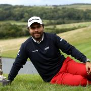 France's Romain Langasque poses with the trophy after winning the ISPS Handa Wales Open at Celtic Manor Resort.