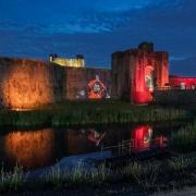 Caerphilly Castle lit up red to support Wales in the Euro 2020 last 16. Picture: RICHARD JONES