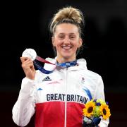 Great Britain's Lauren Williams celebrates with the silver medal after the Women's 67kg Gold Medal contest at the Makuhari Messe Hall A on the third day of the Tokyo 2020 Olympic Games in Japan. Picture: Martin Rickett/PA Wire