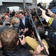Nick Clegg in the middle of a media scrum outside the Riverfront Theatre, Newport yesterday