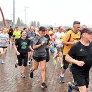 File photo showing runners taking part in the Riverfront Parkrun in Newport.