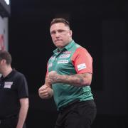 CHAMPS: Gerwyn Price and Jonny Clayton got off to a winning start with Wales