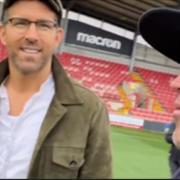 Ryan and Rob on the pitch at the Racecourse. (Image courtesy of robmcelhenney/Instagram)