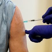 There are rising concerns over the new variant, but the government are urging people to get vaccinated (PA)
