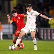 Wales' Neco Williams (left) and Belgium's Thomas Meunier battle for the ball during the FIFA World Cup Qualifying match at the Cardiff City Stadium. Credit: PA