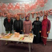 John Griffiths with Fatma Nur Aksoy, her family, and Cllr Farzina Hussain