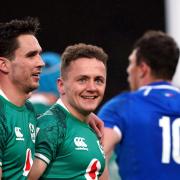 Ireland's Michael Lowry celebrates scoring their side's third try with team-mate Joey Carbery (left) during the Guinness Six Nations match at the Aviva Stadium, Dublin. Picture: PA