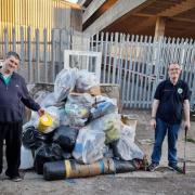 Pride in Pill founder Paul Murphy (right) with another volunteer after the group's litter pick near Clarence Place, Newport. Picture: Pride in Pill