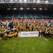 Newport lift the Cup in front of their fans (Picture: Huw Evans Picture Agency Ltd)
