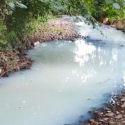 Pollution has caused the discolouration of the Nant yr Aber river in Caerphilly. Picture: NRW.