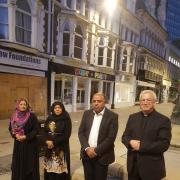 Religious leaders in Newport held a candle-lit vigil in memory of the Queen. Picture: Mubarak Ali.