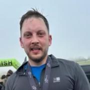 Under starter's orders: Accountant Gareth Pinder started his  'Year of Pain' fundraising marathon with a 10k at Chepstow Racecourse