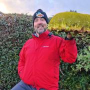 Kevin Fortey with the Guinness World Record winning sunflower head.