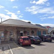 A man has been arrested after allegedly performing a sex act on the footbridge over the railway at Chepstow station.