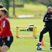Wales manager Rob Page (right) during a training session at Vale Resort, Hensol. Picture date: Monday March 27, 2023.