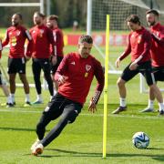 Wales' Aaron Ramsey (centre) during a training session at Vale Resort, Hensol. Picture date: Monday March 27, 2023.