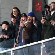 Wrexham owners Ryan Reynolds and Rob McElhenney react during the Vanarama National League match at the Racecourse Ground, Wrexham. Picture date: Monday April 10, 2023.