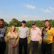 John Griffiths, with fellow MS, Jayne Bryant and Mark Drakeford, the First Minister, and Dave and Mike Knight from Newport Cricket Club