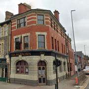 Street view image of The Alma Inn pub in Newport.
