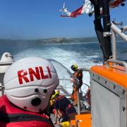 Two children were saved at sea by Tenby RNLI volunteers.
