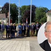 Cllr Alistair Neill, inset, has criticised attendance at an armed forces flag raising ceremony in Usk.