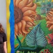 Llanwern High School student Khrystyna Nakonechna with her painting titled 'Images of Ukraine'.