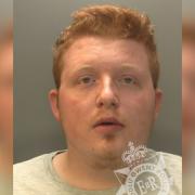 Jay Jones, 23, rammed police cars at Tesco in Ystrad Mynach in front of horrified shoppers trying to escape.