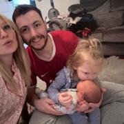 Lauren Worthington (L) with partner Joshua Barnett with daughters Maeven Grace and Baby Darcey Belle