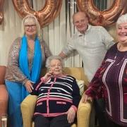 Peggy Tomkins with her three children Ann, Jenny and Peter. Picture: Julie Tomkins/Cwmbran Life