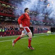 030224 - Wales v Scotland - Guinness 6 Nations 2024 - James Botham of Wales runs out onto the pitch. Picture: Huw Evans Picture Agency