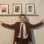 Dante with his pictures at a Monmouth gallery