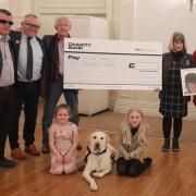 Les Evans with Stephen Ricketts, Ruth Evans and guide dog Crompton, plus "Abergavenny Elvis" Keith Davies and Les's daughter Michelle