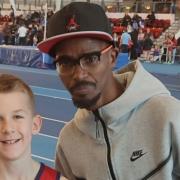 Jayden was given his medal by Sir Mo Farah