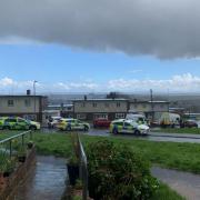 Huge emergency services presence in residential cul-de-sac with air ambulance