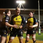 JOY: Aneurin Owen, left, and Jared Rosser both scored for the Dragons against Zebre