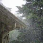 Ensuring gutters are free from debris and leaves can prevent water damage to a home
