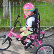 A specialist trike is bringing unbridled joy to four-year-old Abi-Rose Burkedin